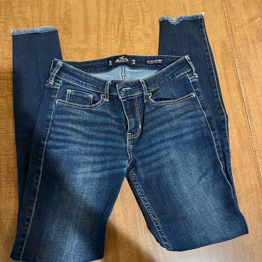 Hollister Women's Medium-Dark Blue Skinny Jeans with Frayed Hem